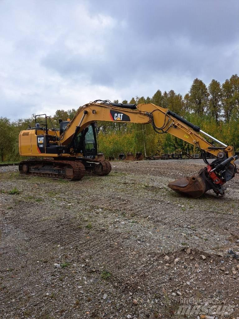 CAT 318 E L Гусеничні екскаватори