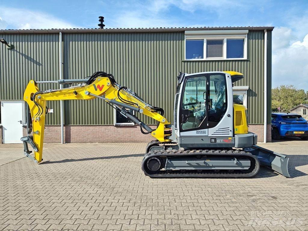 Wacker Neuson ET90 Колісні екскаватори