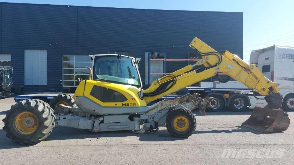 Menzi Muck M535 Колісні екскаватори