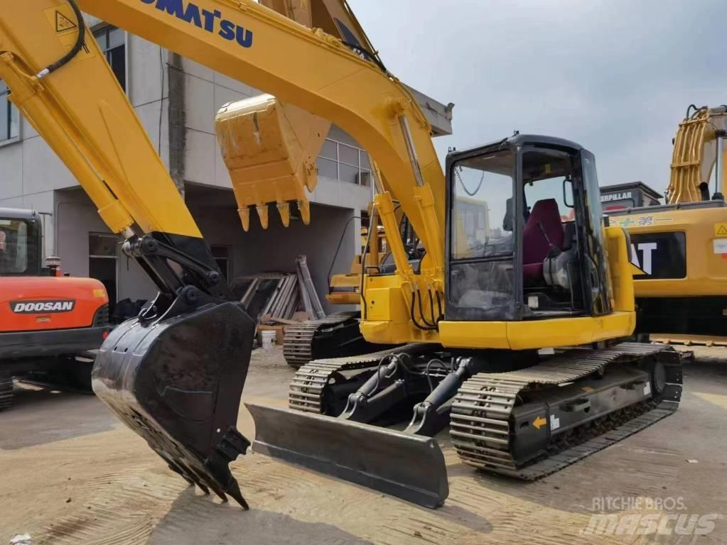 Komatsu PC 128US Середні екскаватори 7т. - 12т.