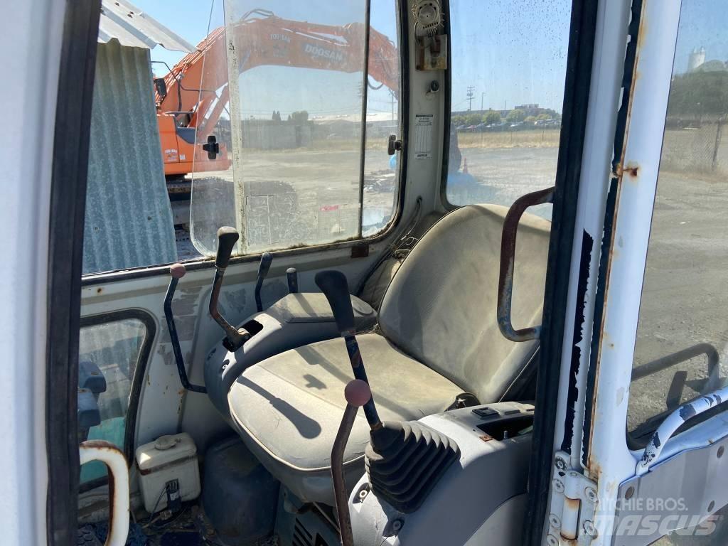 Hyundai ROBEX 450 Гусеничні екскаватори