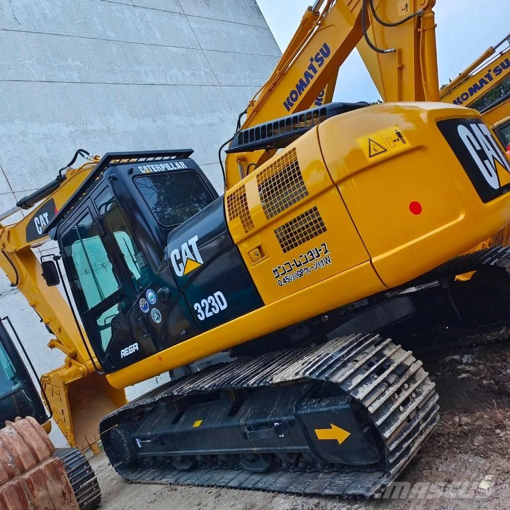 CAT 323 D Гусеничні екскаватори