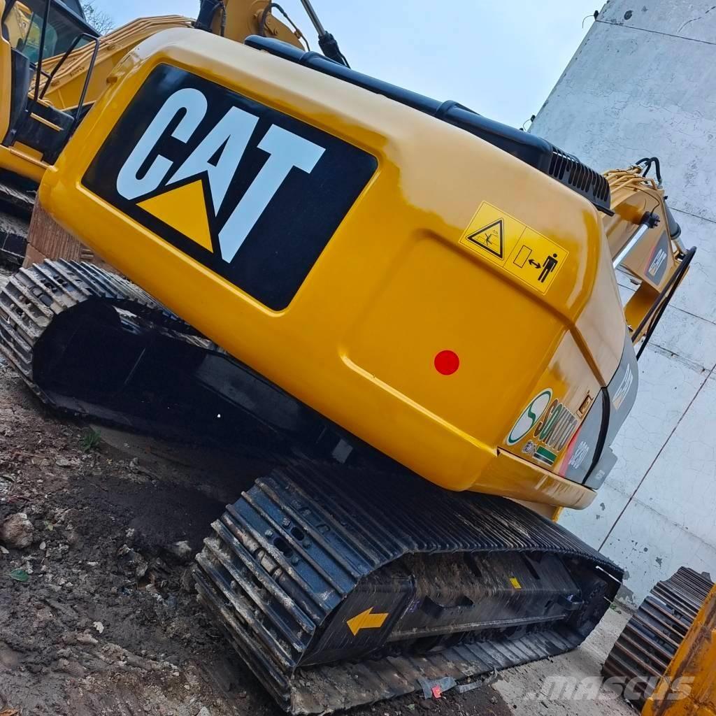 CAT 323 D Гусеничні екскаватори