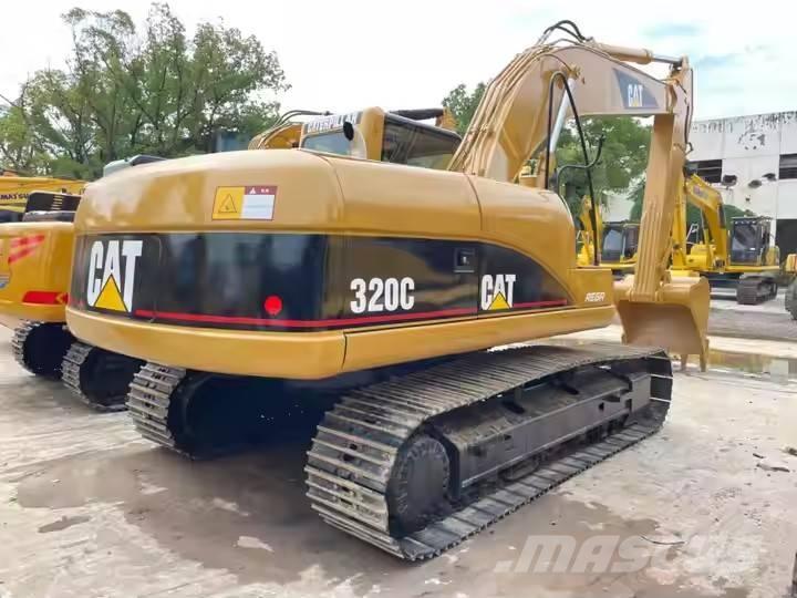 CAT 320 C Гусеничні екскаватори