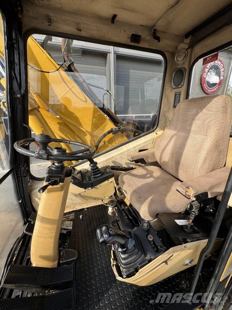 CAT M 315 Колісні екскаватори