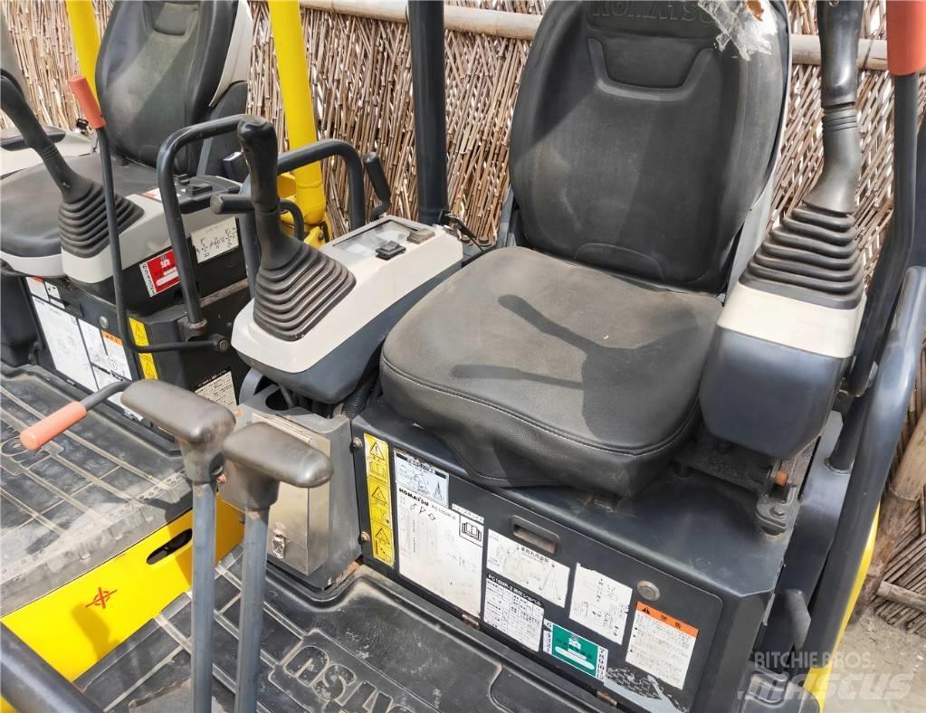 Komatsu PC18 Гусеничні екскаватори