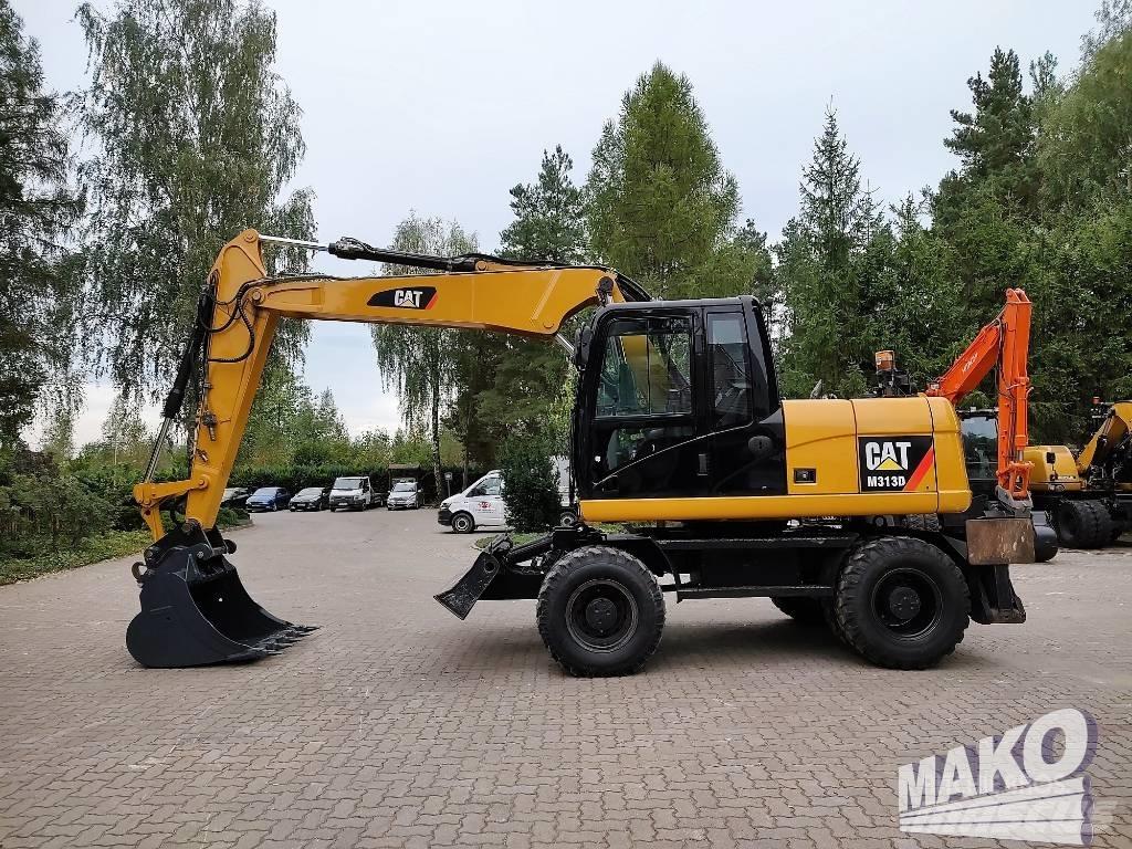 CAT M 313 D Колісні екскаватори