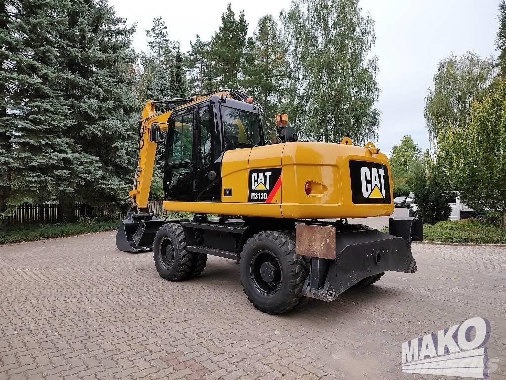 CAT M 313 D Колісні екскаватори