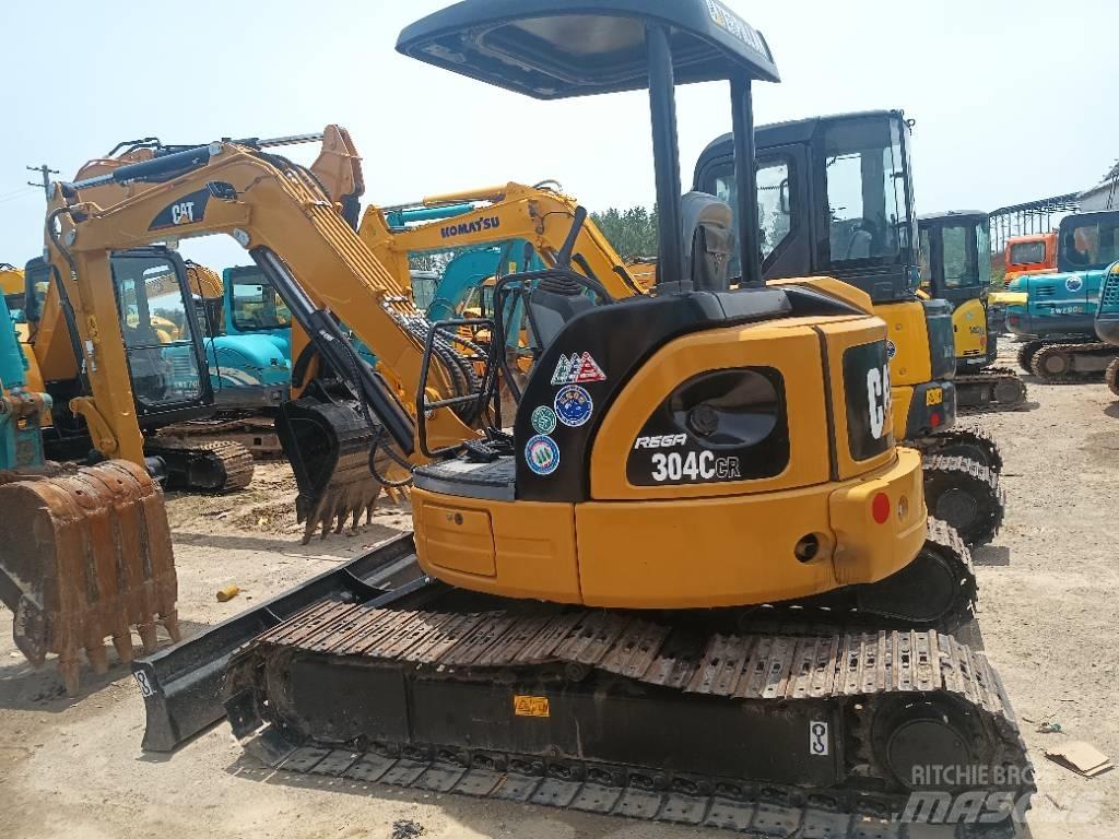 CAT 304 C Гусеничні екскаватори