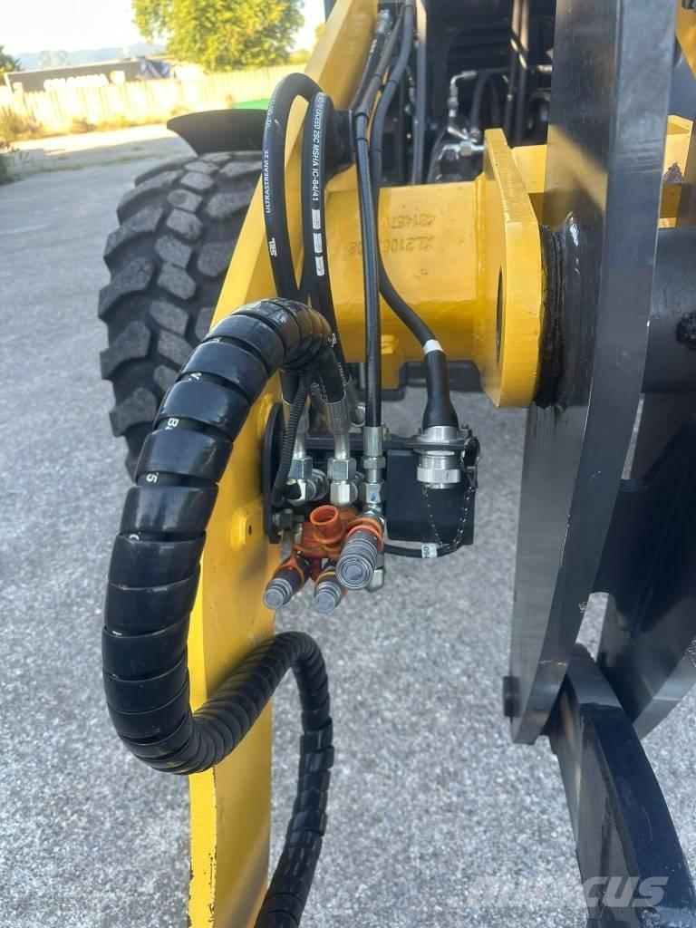 New Holland W 80 C Фронтальні навантажувачі