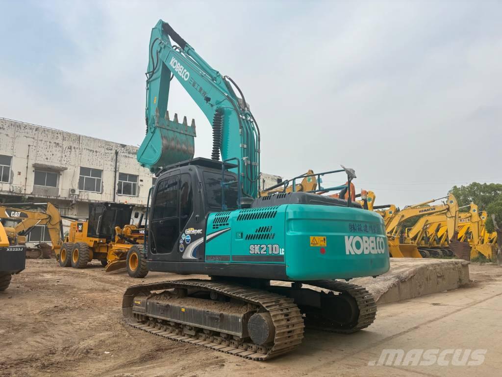 Kobelco SK 210 Гусеничні екскаватори