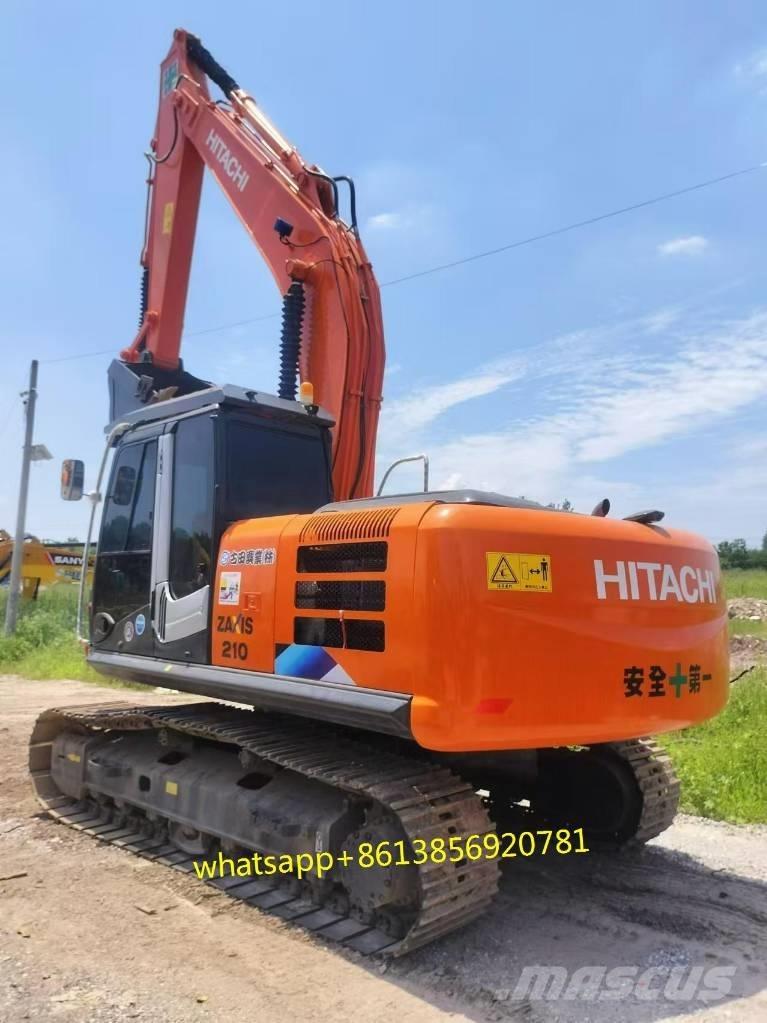 Hitachi ZX 210 Гусеничні екскаватори