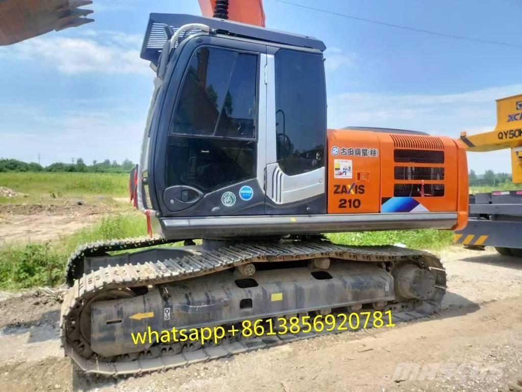 Hitachi ZX 210 Гусеничні екскаватори