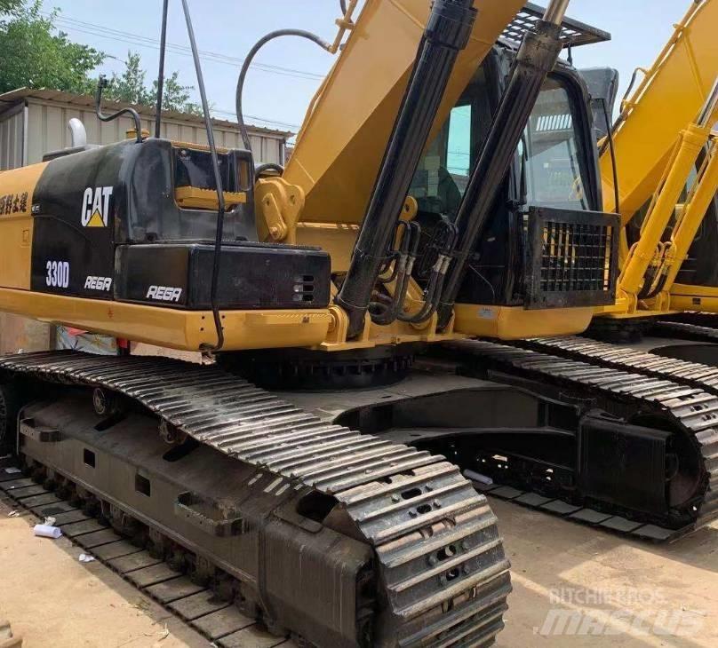 CAT 330DL Гусеничні екскаватори