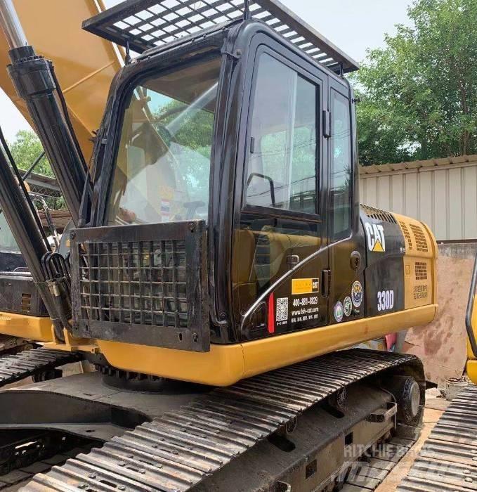 CAT 330DL Гусеничні екскаватори