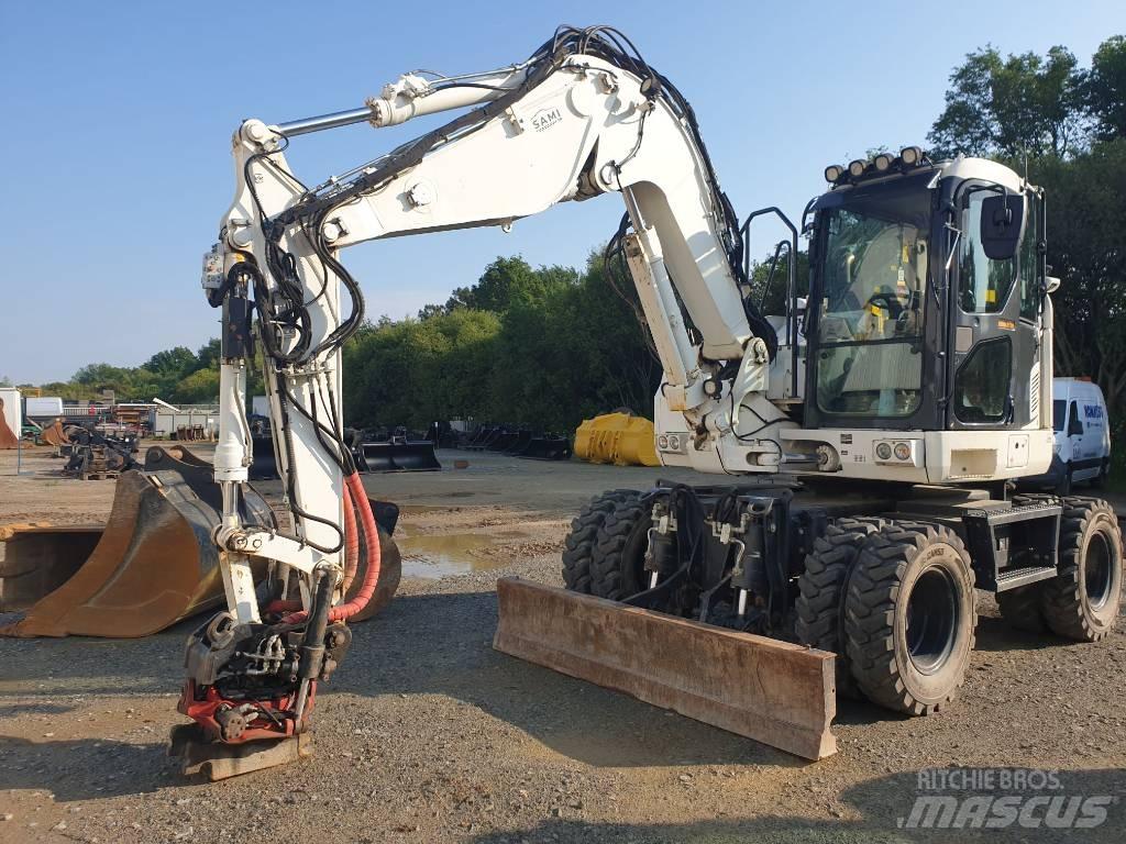 Komatsu PW118MR-11 Колісні екскаватори