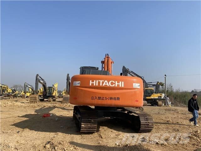 Hitachi ZX210 Гусеничні екскаватори