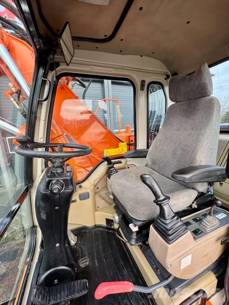 Doosan SOLAR 140W-V Колісні екскаватори