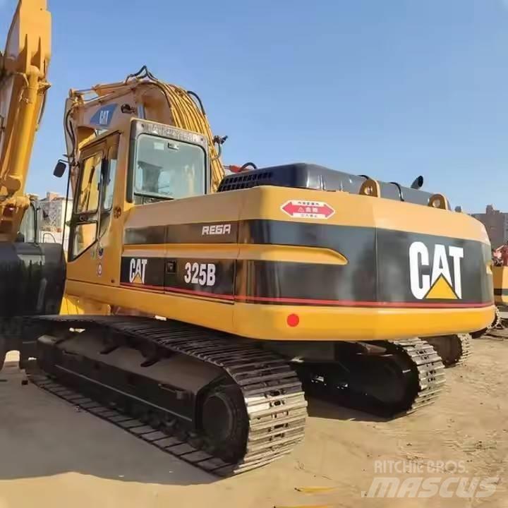 CAT CAT323B Середні екскаватори 7т. - 12т.
