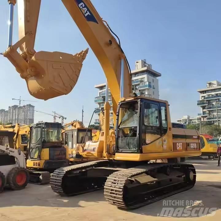 CAT CAT323B Середні екскаватори 7т. - 12т.