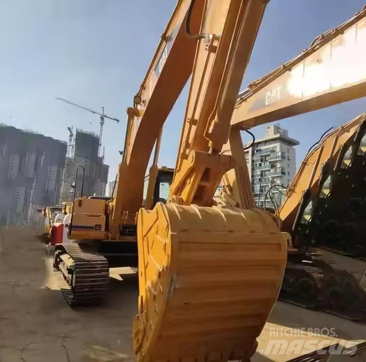 CAT CAT323B Середні екскаватори 7т. - 12т.