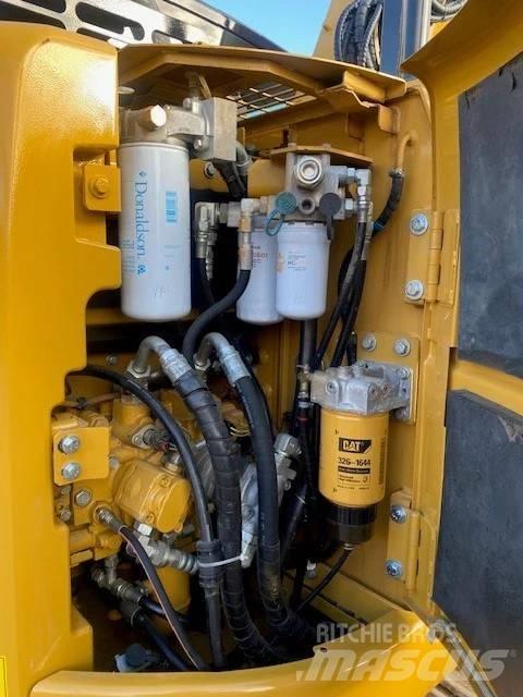 CAT 313 Гусеничні екскаватори