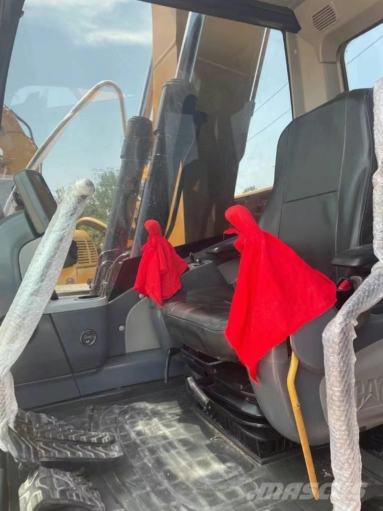 CAT 312D Середні екскаватори 7т. - 12т.