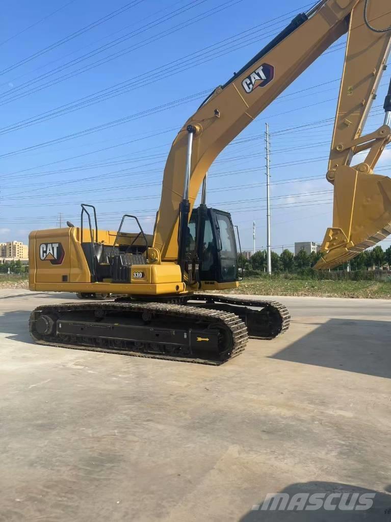 CAT 330 Гусеничні екскаватори