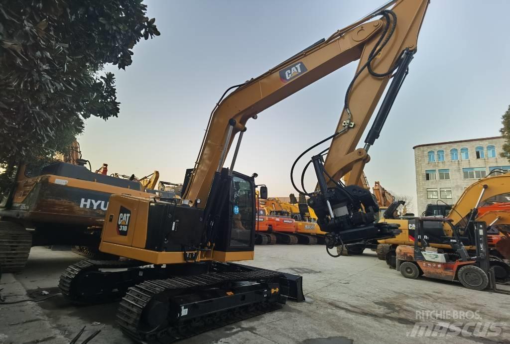 CAT 310 Гусеничні екскаватори