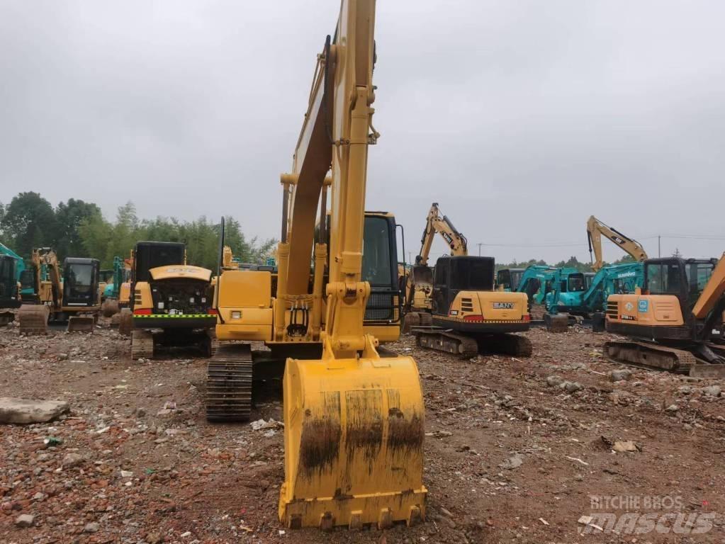 Komatsu PC 130 Середні екскаватори 7т. - 12т.