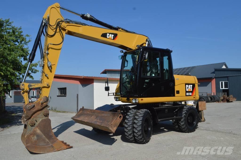 CAT M 313 D Колісні екскаватори