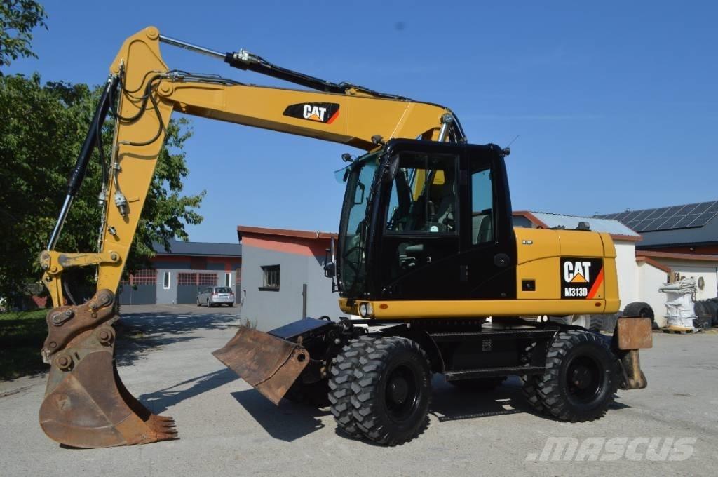 CAT M 313 D Колісні екскаватори