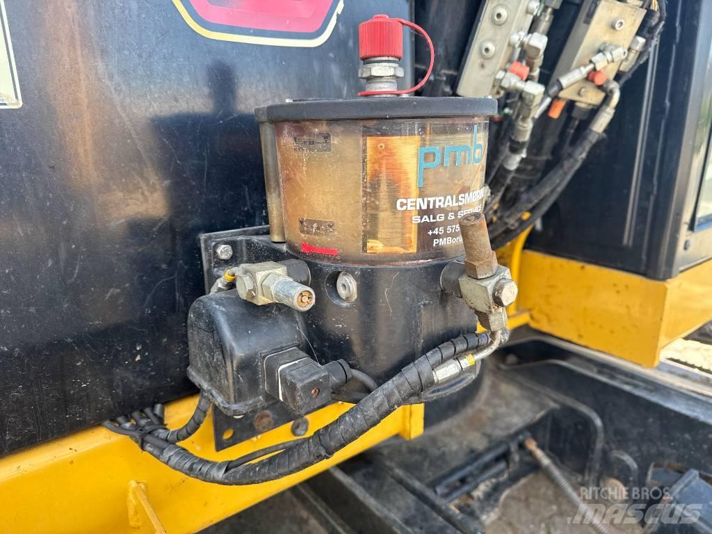 CAT 310 Гусеничні екскаватори