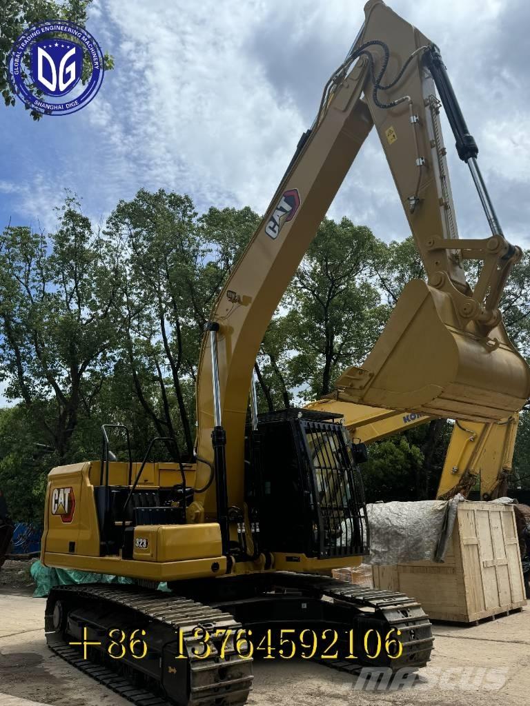 CAT 323 Гусеничні екскаватори