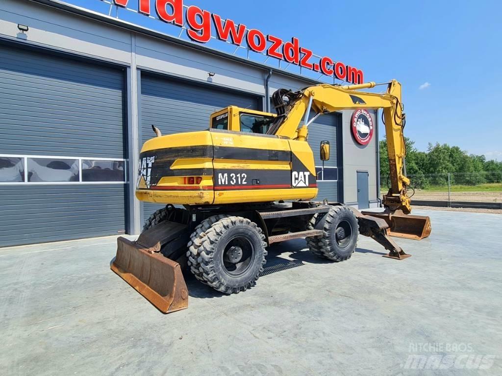 CAT M 312 Колісні екскаватори