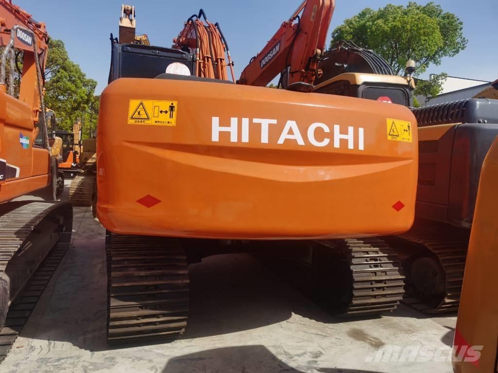 Hitachi ZX 210 Гусеничні екскаватори