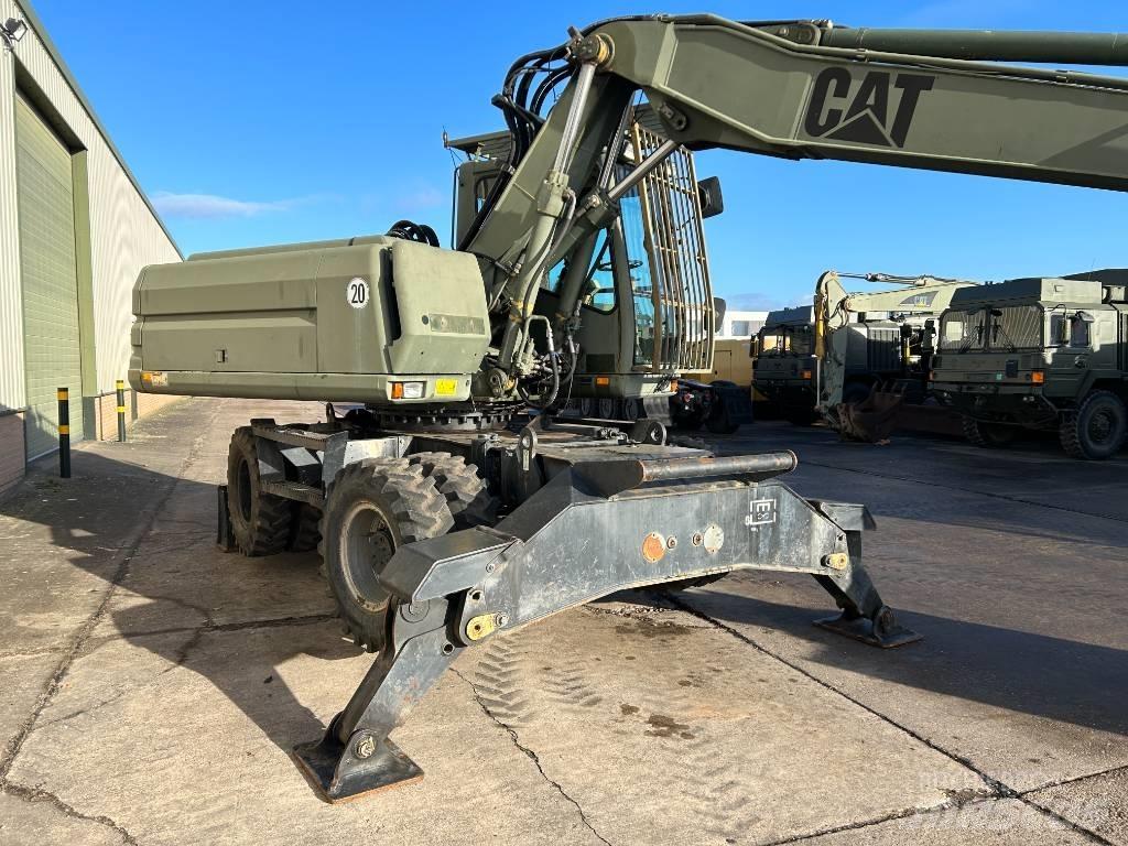 CAT 318 Колісні екскаватори