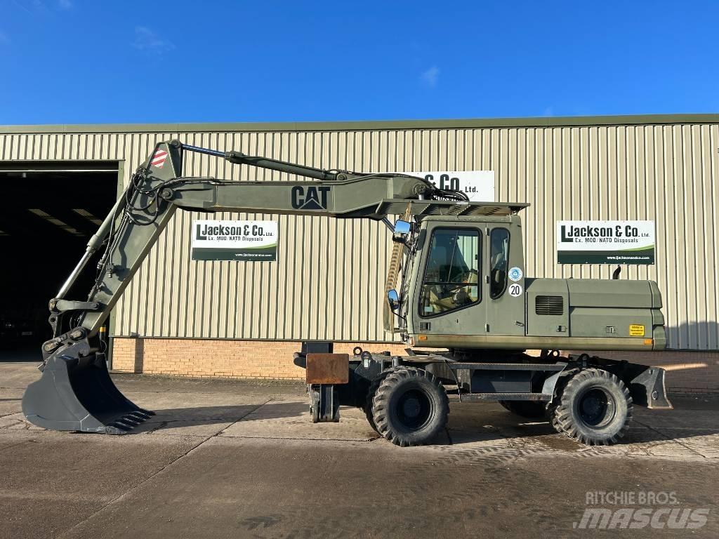 CAT 318 Колісні екскаватори