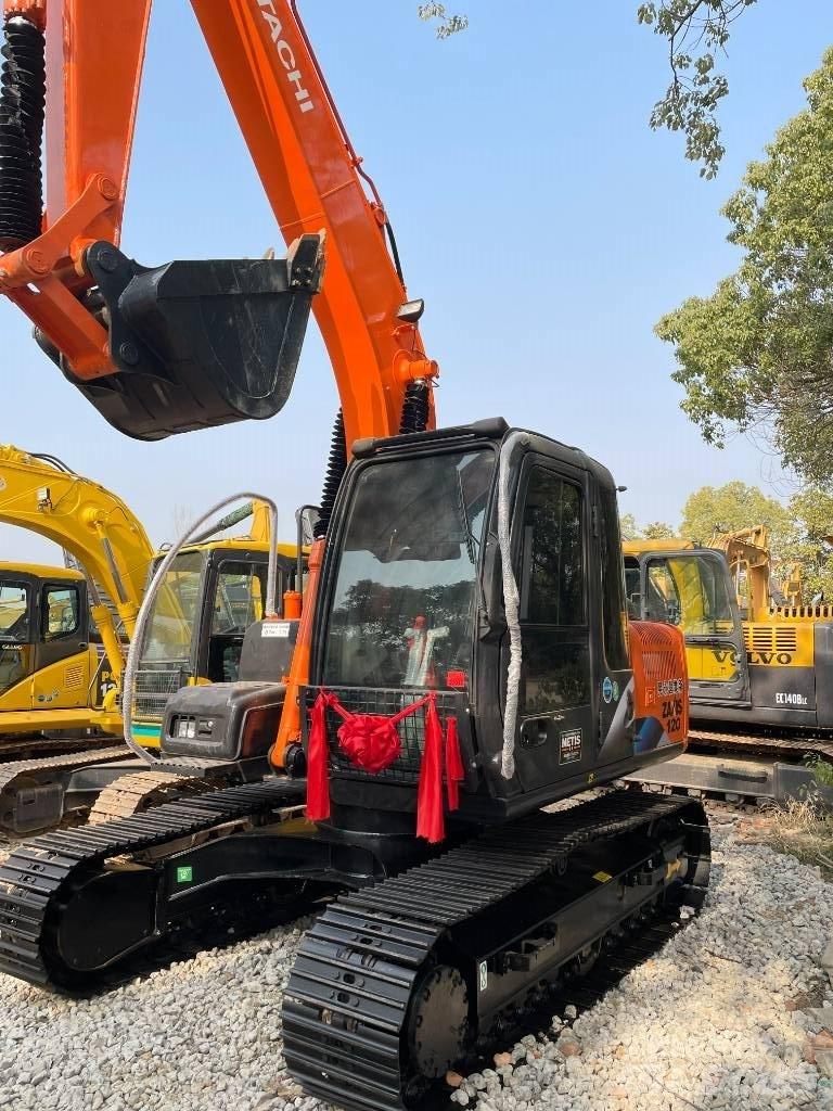 Hitachi 120 Гусеничні екскаватори