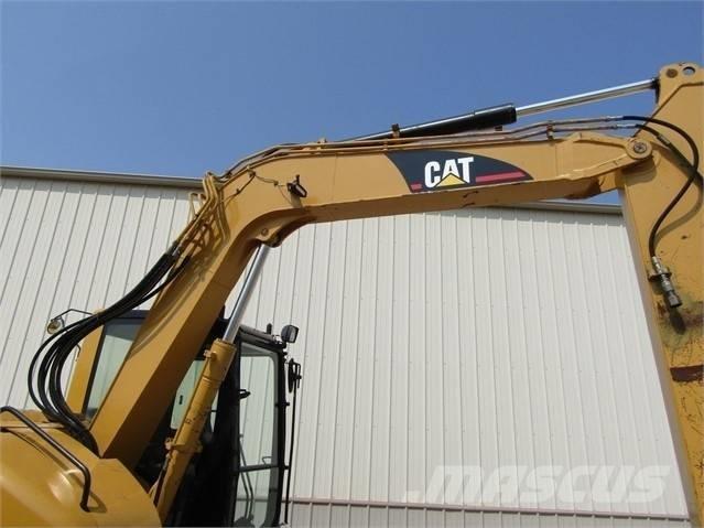 CAT 308 C Середні екскаватори 7т. - 12т.