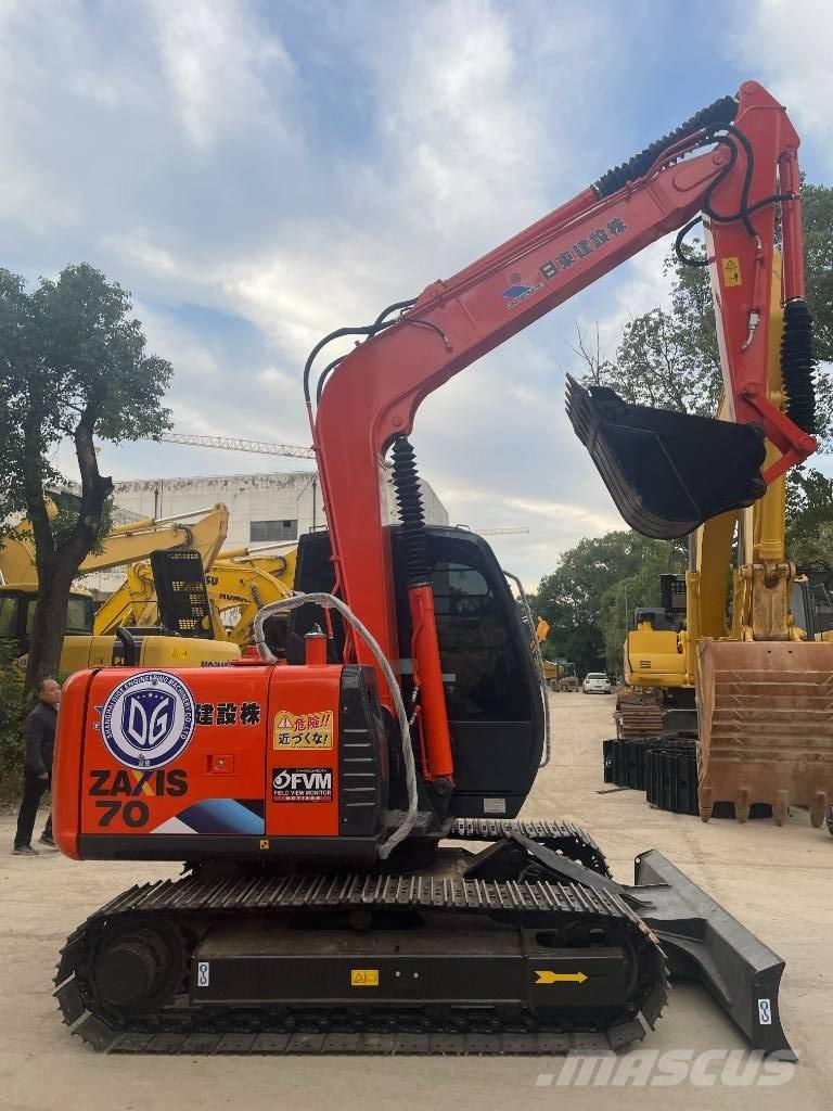 Hitachi ZX 70 Міні-екскаватори < 7т