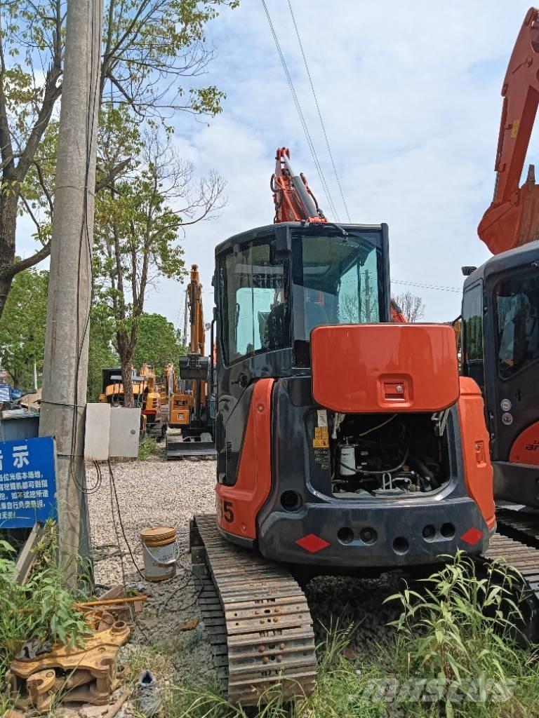 Hitachi zx55 Гусеничні екскаватори
