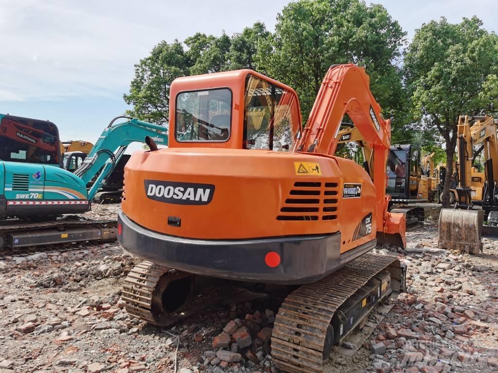 Doosan DX75 Середні екскаватори 7т. - 12т.