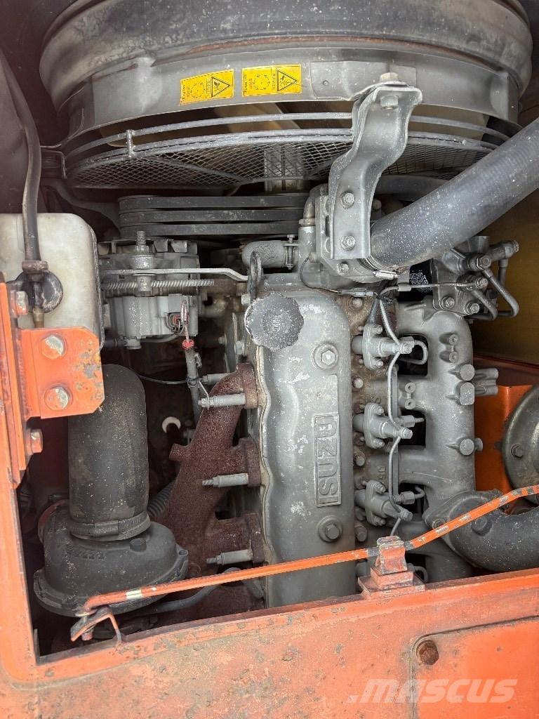 Hitachi EG 70 R Гусеничні самоскиди