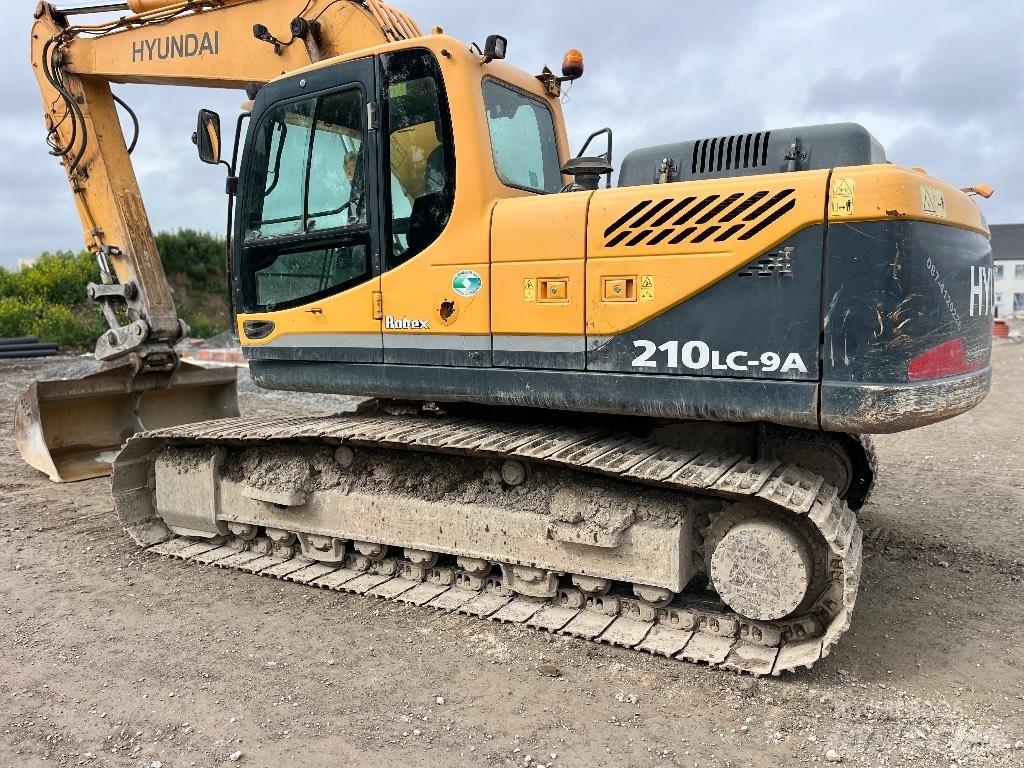Hyundai Robex 210–9 Гусеничні екскаватори