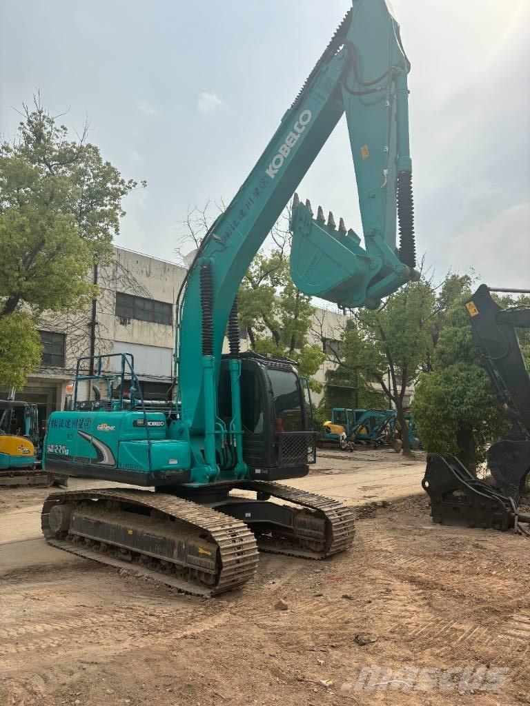 Kobelco SK210 Гусеничні екскаватори