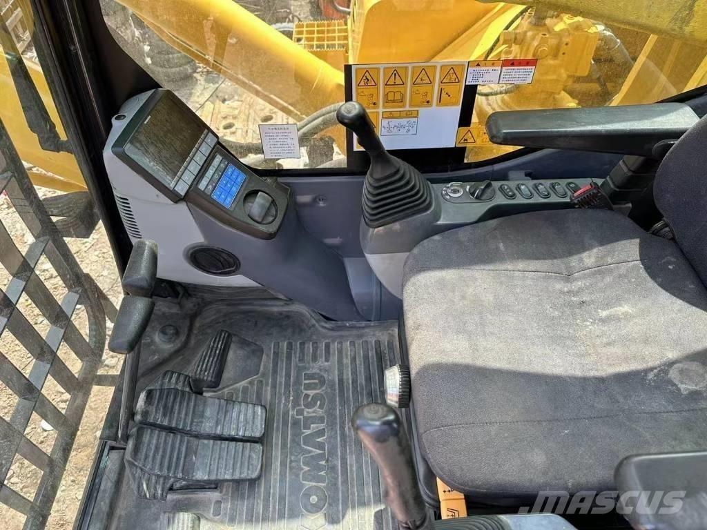 Komatsu PC 850-8 Екскаватори-амфібії