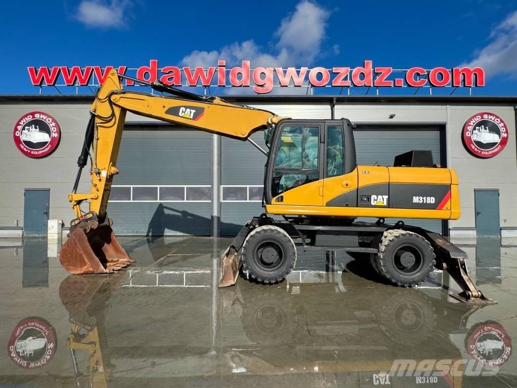 CAT M 318 D Колісні екскаватори