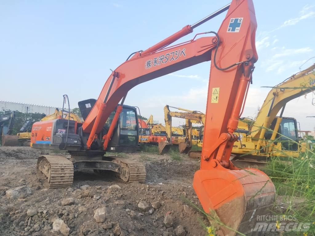 Hitachi ZX 210 Гусеничні екскаватори