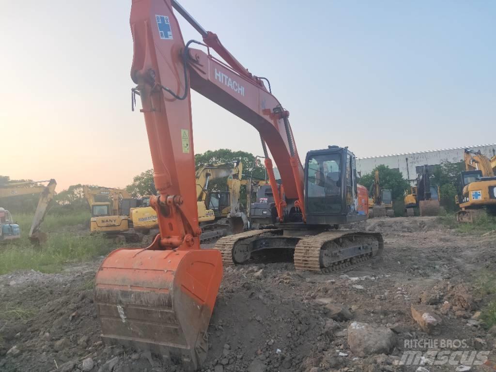 Hitachi ZX 210 Гусеничні екскаватори